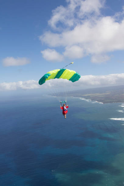 istock Paraglider flies towards the earth 1055667836