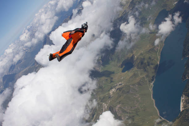 istock Wingsuiter falls towards the earth 1055668062