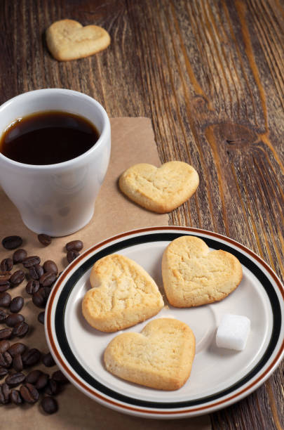 istock Shortbread cookies in shape of heart and coffee 1055675416
