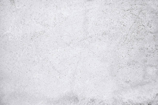 istock Old white gray cement dusty wall textured background. 1055677774