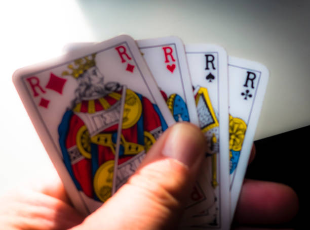 istock playing cards, holding cards, poker 1055683756