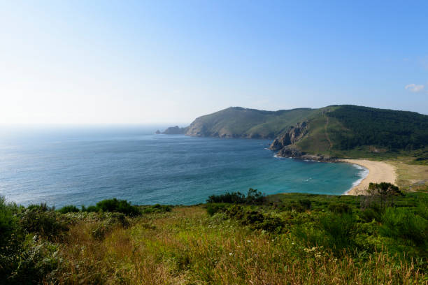 High angle landscape view of Playa Mar de Fora in Finisterre, Spain. Finisterre is the final destination for many pilgrims on the Camino de Santiago.