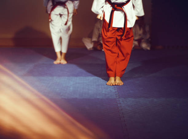 istock Taekwondo athletes bare feet martial art attention on floor 1055688890