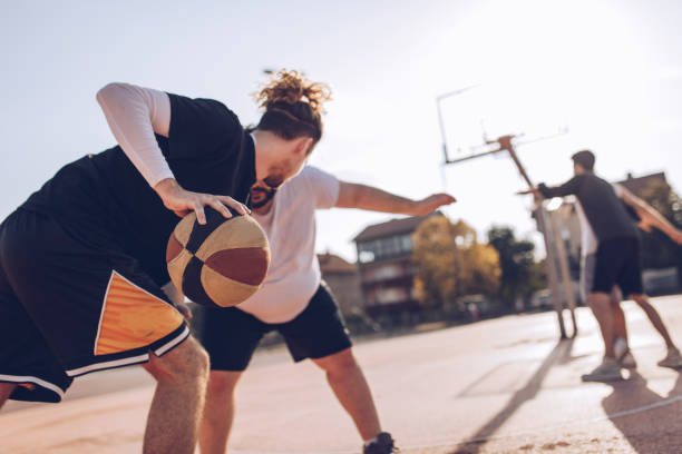 istock MEn playing streetball 1055688988