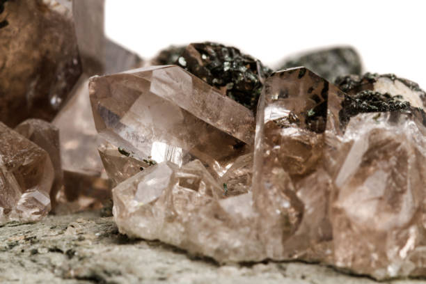 istock Macro mineral stone quartz chlorite Palygorskite rock on a white background 1055693652