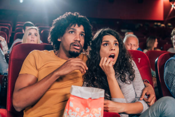 istock Terrified couple at cinema 1055698636