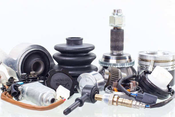 istock automobile engine parts isolated on white background. Auto shop 1055698824