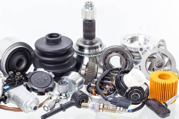 istock automobile engine parts isolated on white background. Auto shop 1055698976