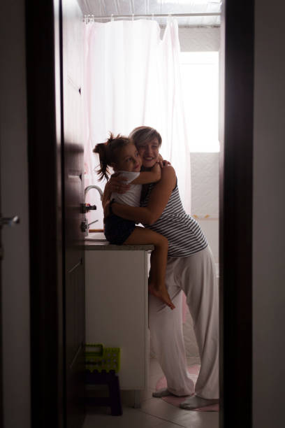 istock mother and daughter embracing 1055699004