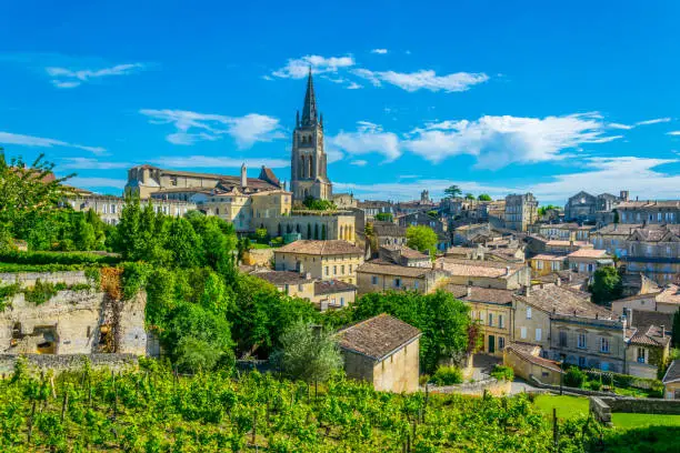 Photo of Aerial view of French village Saint Emilion dominated by spire of the monolithic church