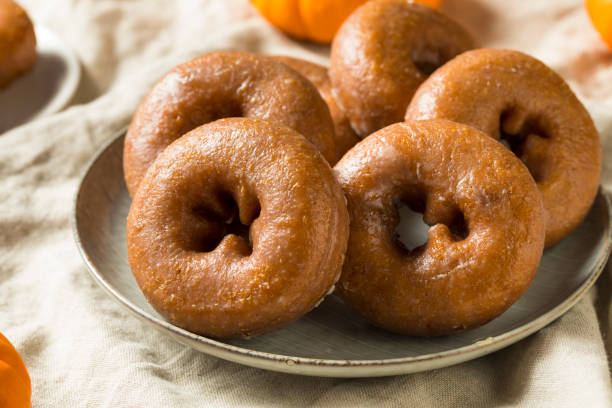istock Homemade Pumpkin Spice Donuts 1055707752