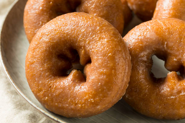 istock Homemade Pumpkin Spice Donuts 1055707832