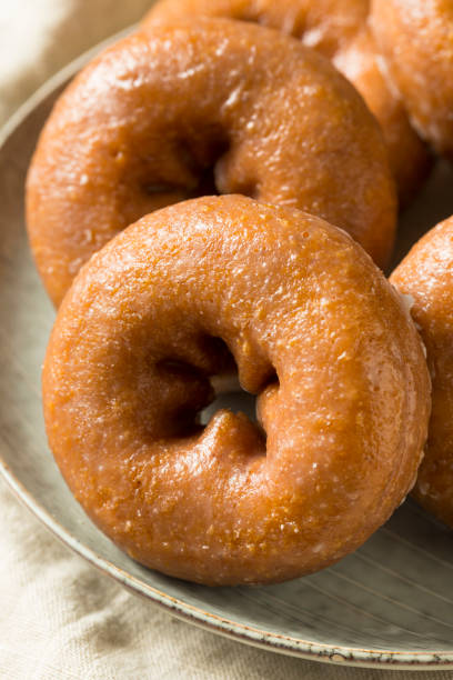 istock Homemade Pumpkin Spice Donuts 1055709110