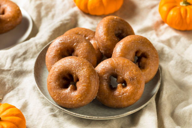 istock Homemade Pumpkin Spice Donuts 1055709412