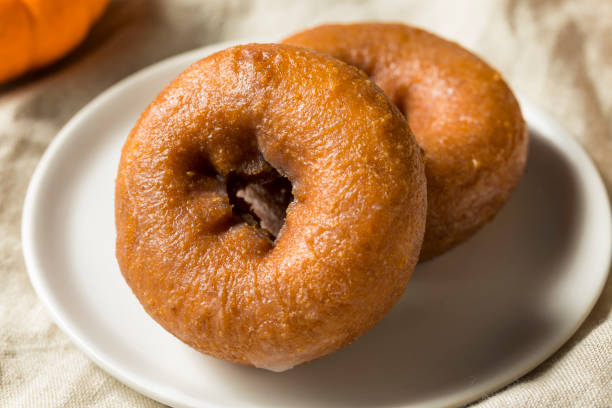 istock Homemade Pumpkin Spice Donuts 1055709836
