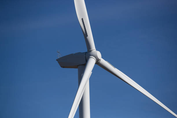 istock Wind Turbine, Clear Blue Sky 1055711748