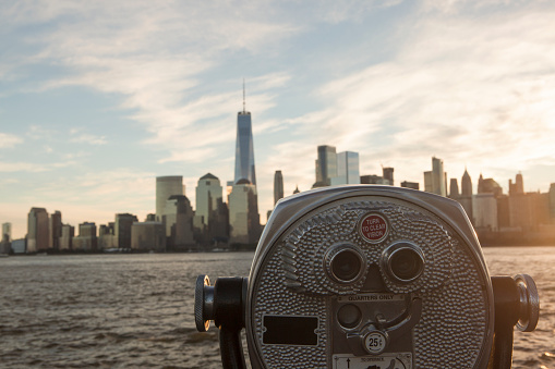 Sightseeing Tourist coin operated Binoculars with the Manhattan skyline in the background.