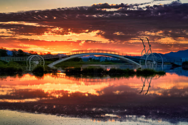 istock VD702 The sunrise from a Bicycle bridge 1055718514