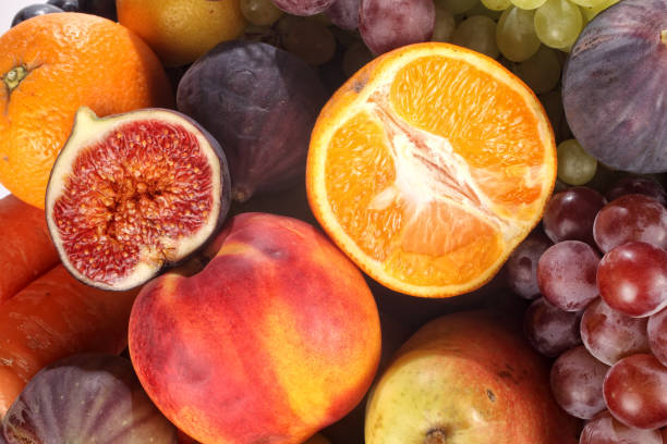 istock Close up various fresh fruits pile 1055718892