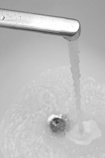 istock tap with strong stream of water 105582525