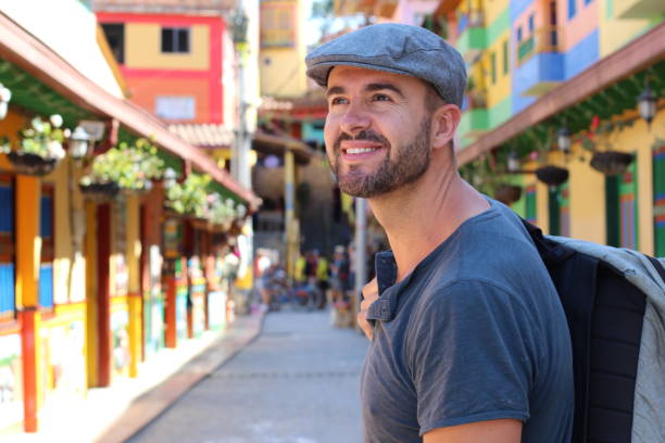 Handsome tourist visiting Guatape, Colombia