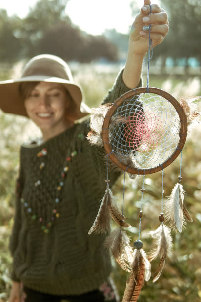 istock Beautiful woman wearing hat and outfit 1055867402