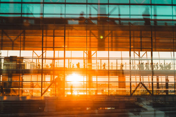 istock Overview of people at Airport taking flights. 1055867954