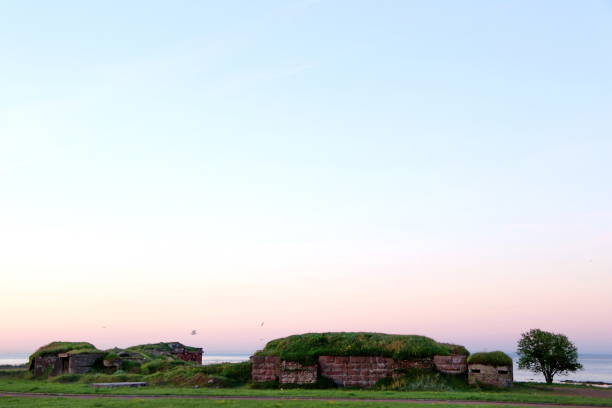 istock ancient fortification by the sea on the sunrise 1055870656