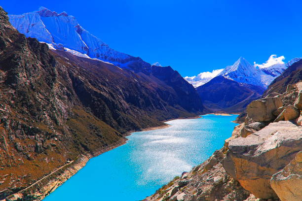 istock Paron lake in Cordillera Blanca, snowcapped Peruvian Andes - Ancash, Peru 1055873616