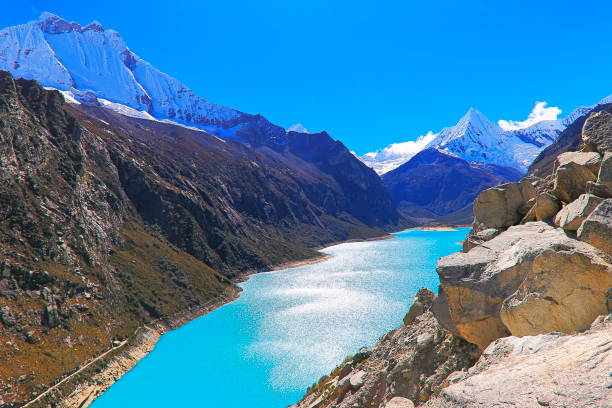 istock Paron lake in Cordillera Blanca, snowcapped Peruvian Andes - Ancash, Peru 1055873742