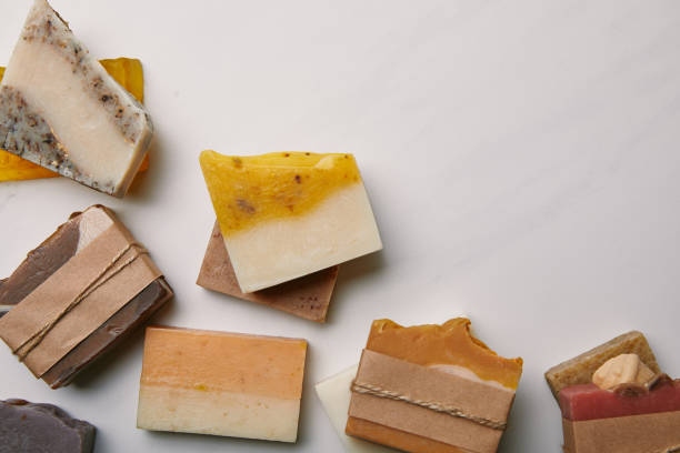 istock top view of various handmade soap pieces on white marble surface 1055874064