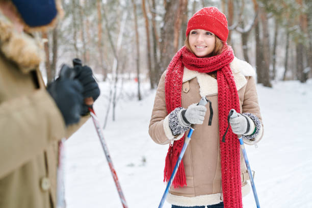 istock Young Woman Enjoying Skiing Date 1055874092