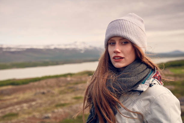 istock Female traveler posing in icelandic wilderness 1055875934