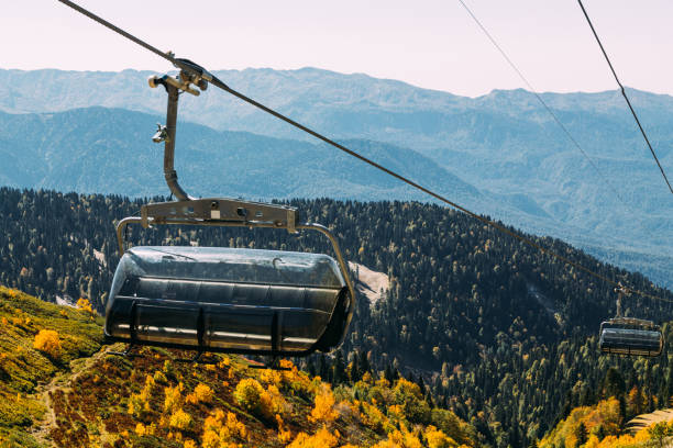 istock Funicular high in the mountains above the autumn forest 1055876914