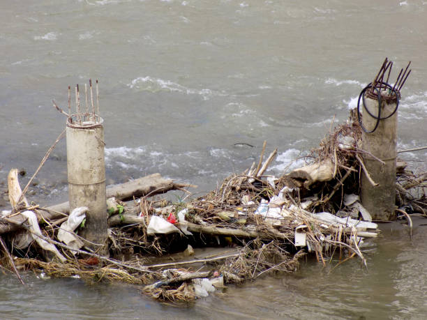 istock The garbage that runs into the river contaminates the drinking water 1055881428