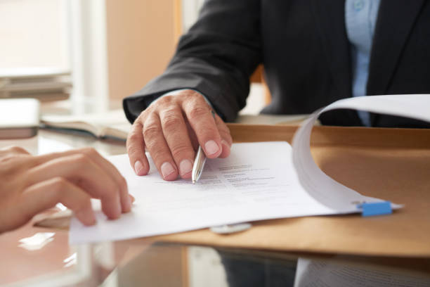 istock Business people signing a contract 1055883692