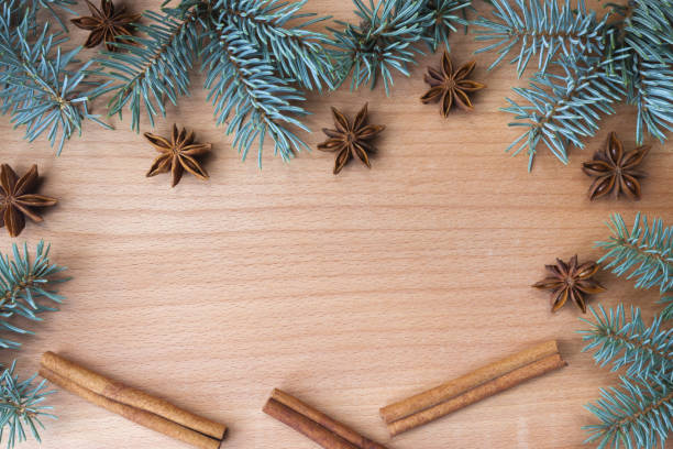 istock Christmas decoration spices on a wooden background 1055884202