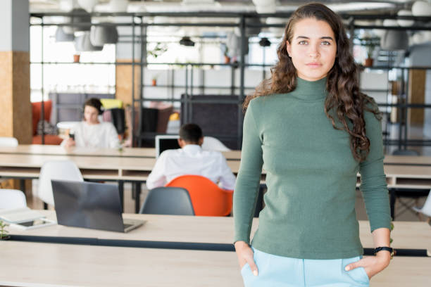 istock Content successful lady working in modern company 1055887850