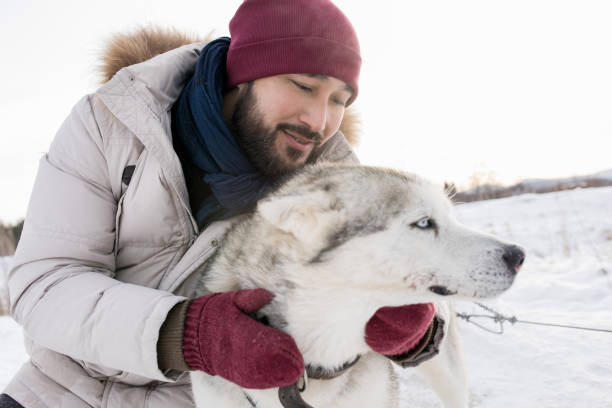 istock Asian Man with Gorgeous Dog 1055888328