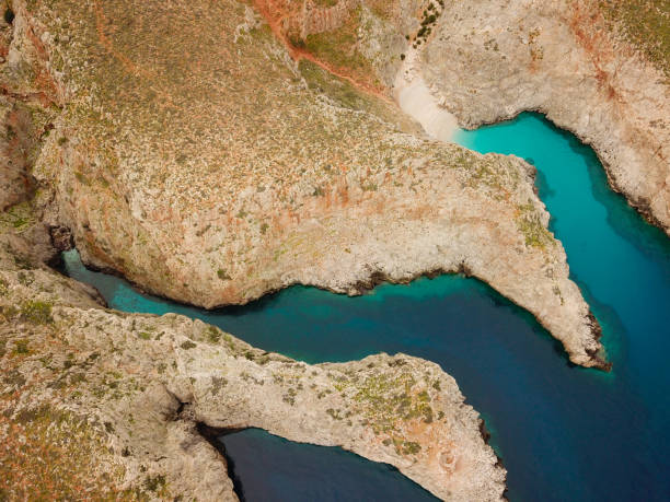 istock Secret beach on remote island. Rizoskloko (Seitan Limani), Crete 1055888980