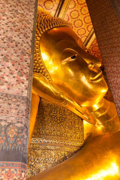 istock Lying down Buddha statue in Wat Pho  temple , Bangkok, Thailand 1055888984