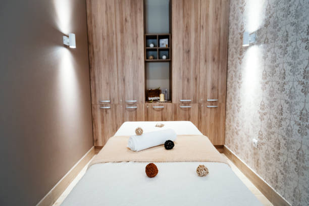 istock Modern massage room with beautiful interior 1055889560