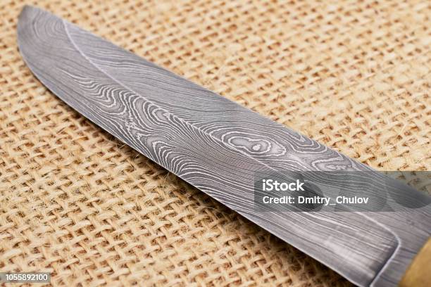 https://media.istockphoto.com/id/1055892100/photo/traditional-handmade-finnish-knife-made-of-damascus-steel.jpg?s=612x612&w=is&k=20&c=jJgIL616rH7_5IyiWRVxZ5meQhATl_raFnVW90DOUps=
