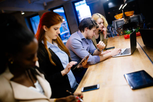 istock Business people bonding in cafe 1055895116