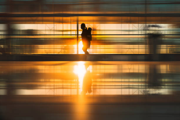 istock Travelling with kids at airport terminal. 1055899888