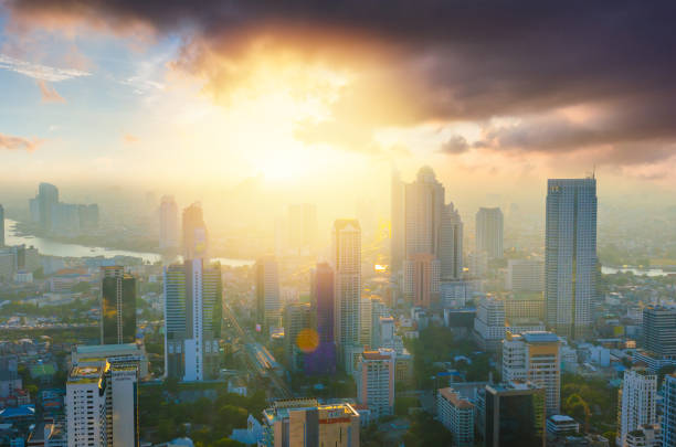 Panoramic view Cityscape business district from aerial view high building at dusk (Bangkok, Thailand)