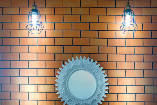 istock Light bulb and lamp in modern style. Lamps in coffee shop 1055902938