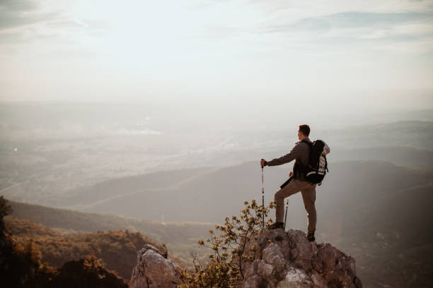 istock Hiker on mountains enjoy sunset 1055902988
