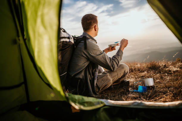 istock Hiking young man and lunch break 1055904018