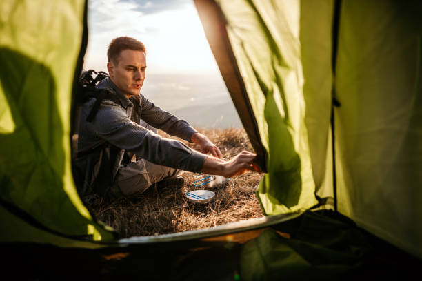 istock Hiking young man and lunch break 1055904352